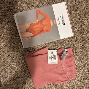 Wolford Vibrant Orange Bodysuit and Soft Pink Leggings
